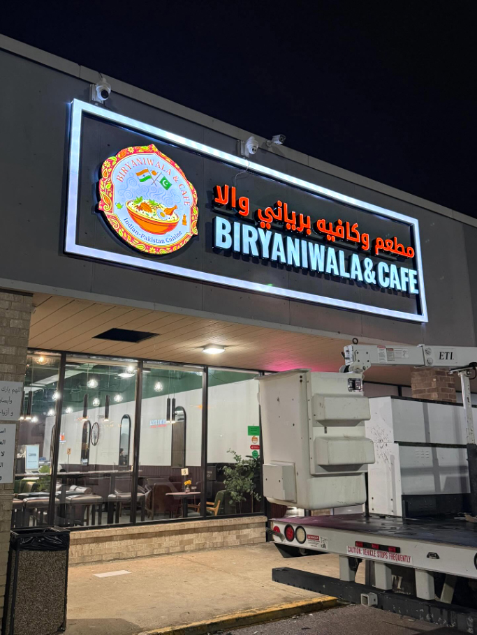 Biryanwala and Cafe illuminated custom storefront sign at night