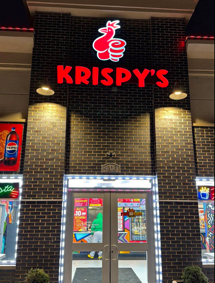 Krispy's illuminated dimensional storefront lettering and logo