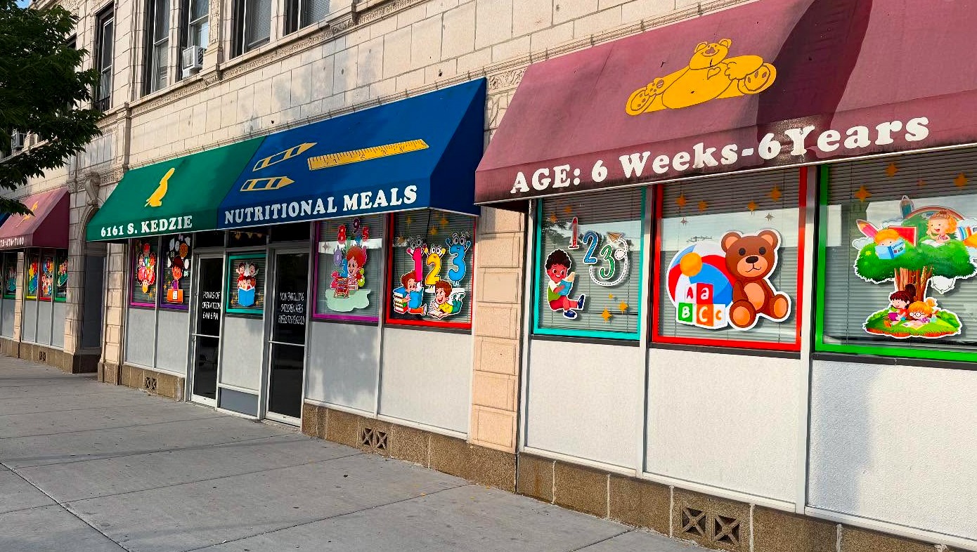 Day care storefront with colorful educational window decals