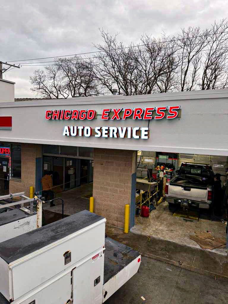 Chicago Express Auto Service – Bold red and white channel letters installed across the automotive shop façade.
