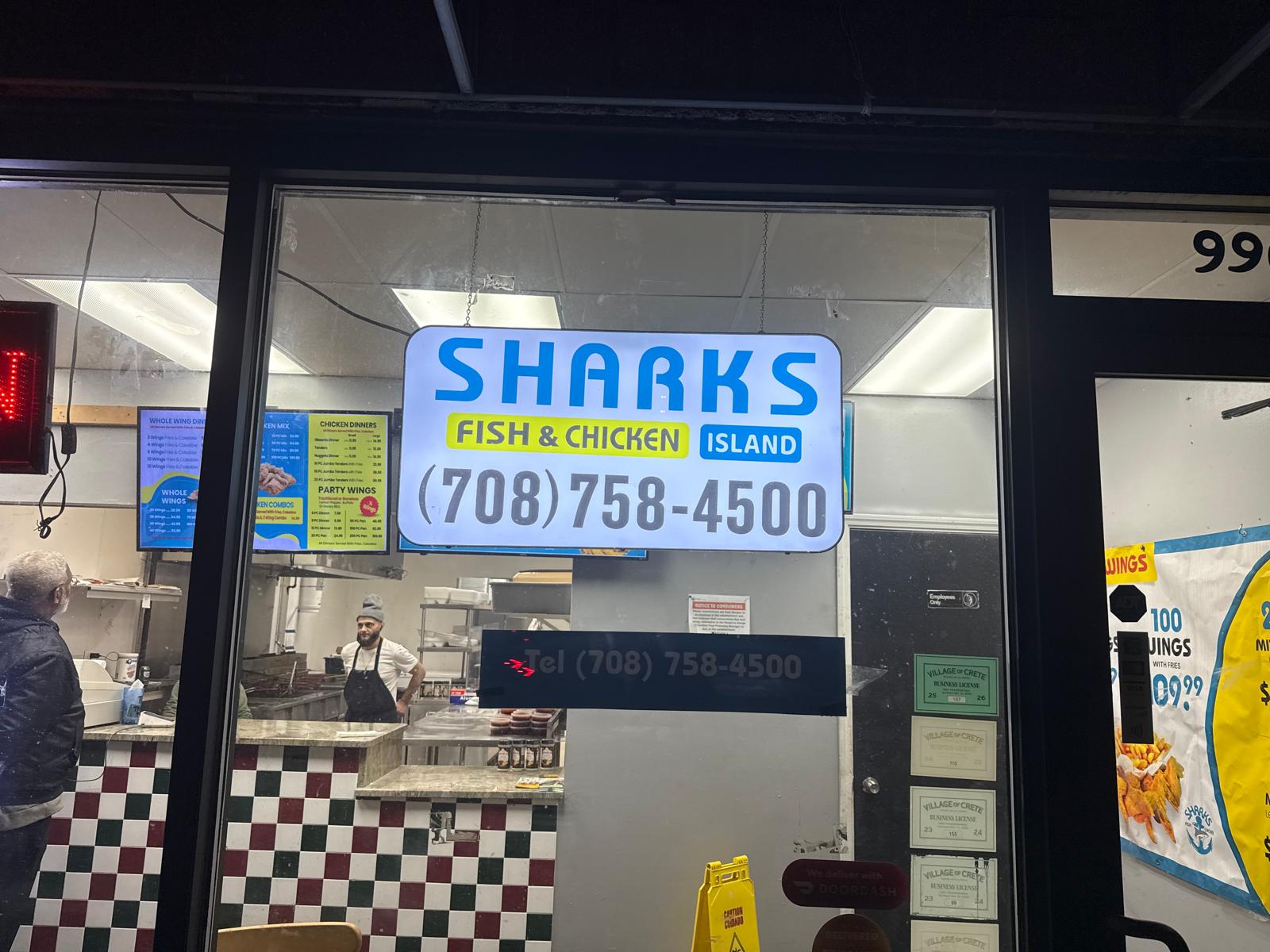 Sharks Fish and Chicken custom hanging storefront sign
