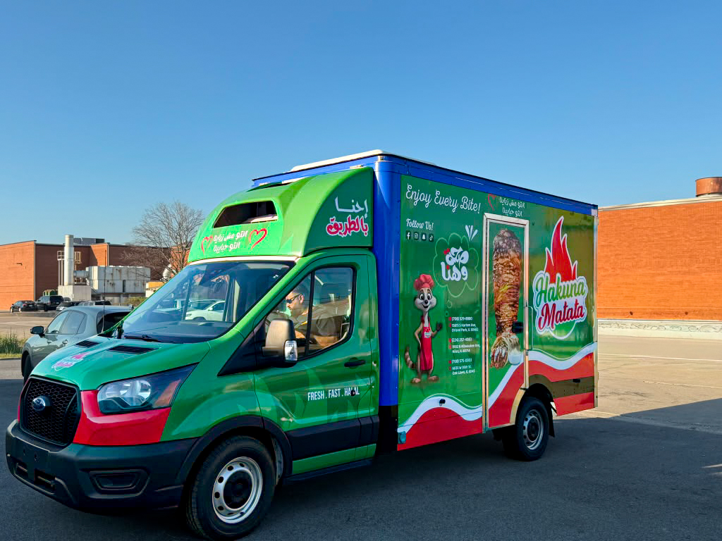 Side view of the Hakuna Matata full box truck wrap