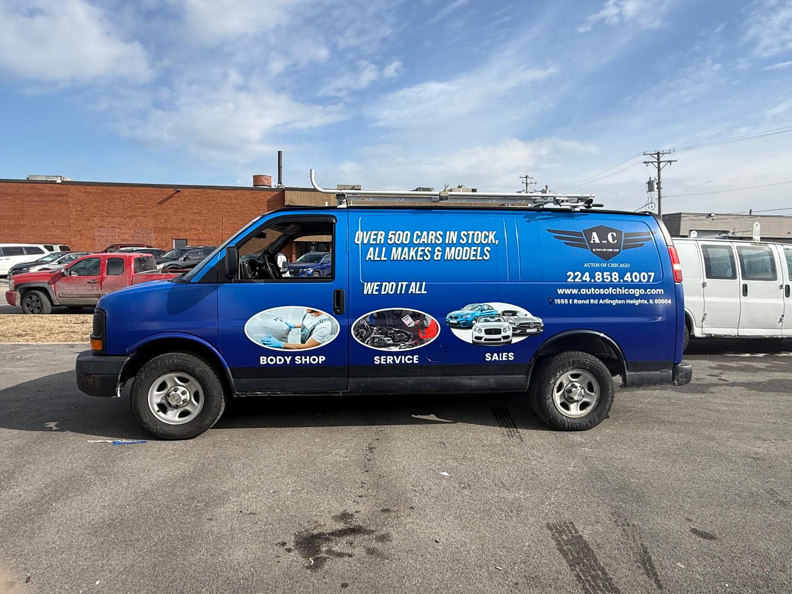 Autos of Chicago blue commercial van wrap viewed from the side