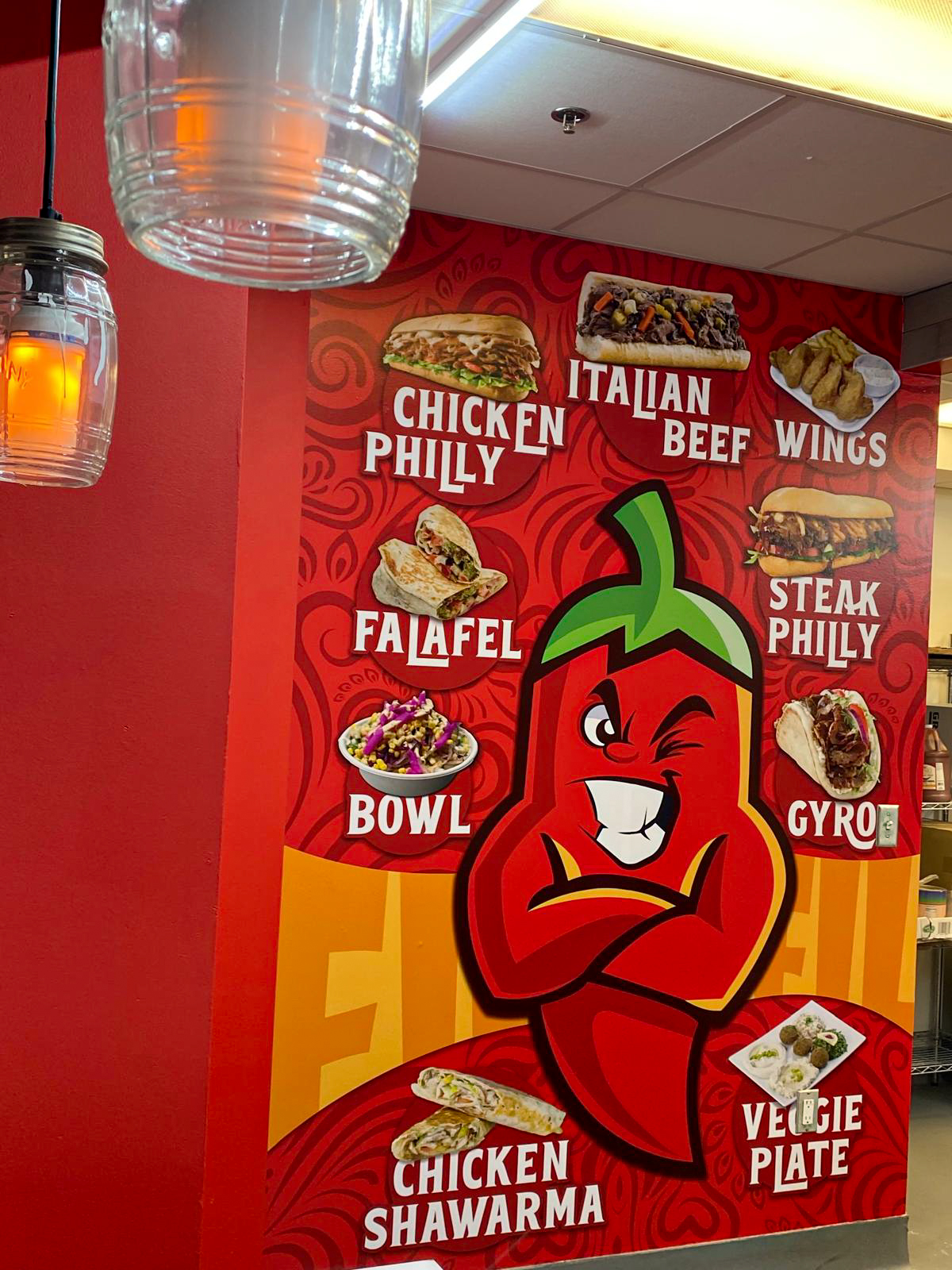 restaurant interior with a large custom menu wall mural.