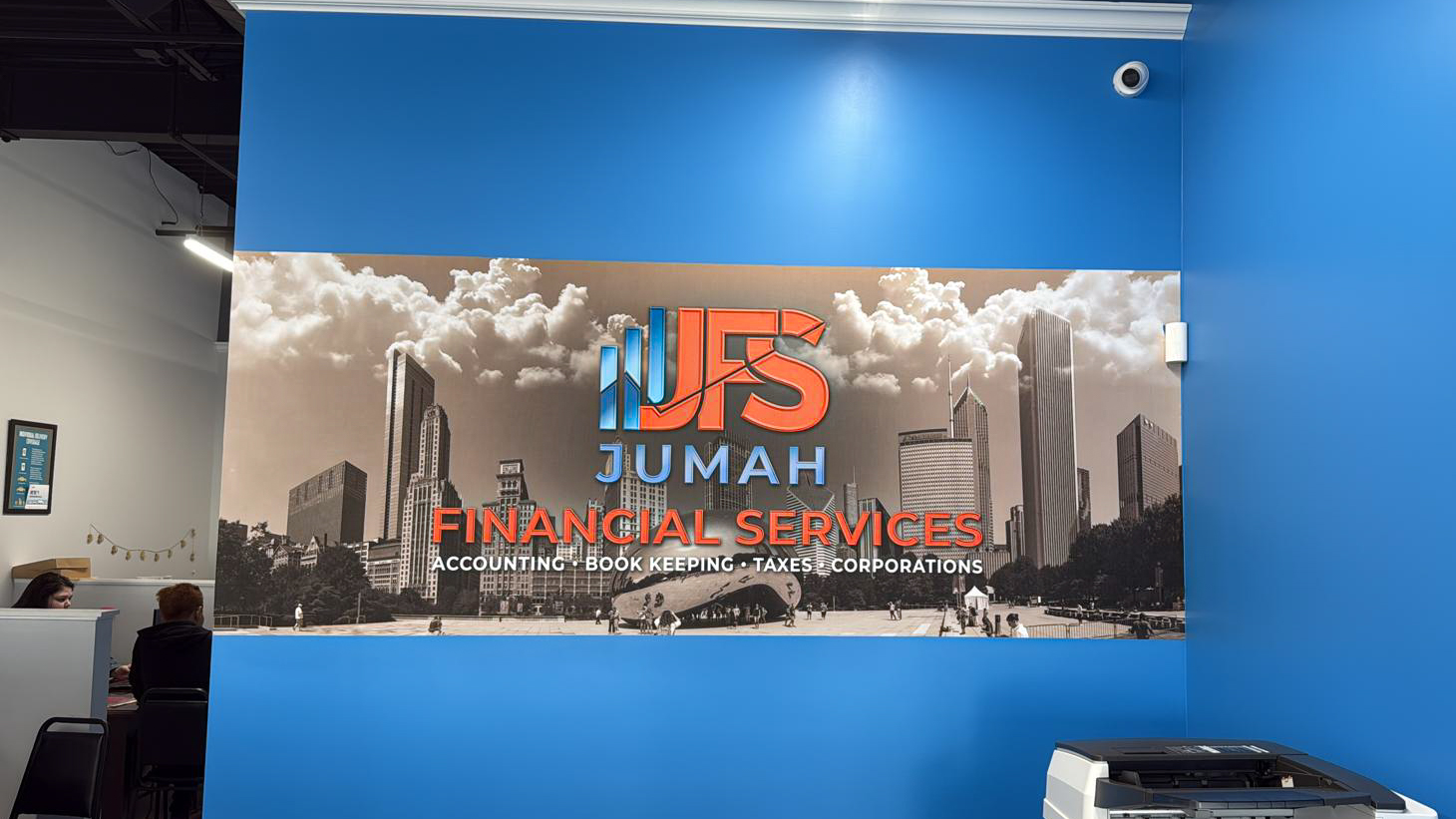 Jumah Financial Services office interior with a custom Chicago-themed branded wall mural