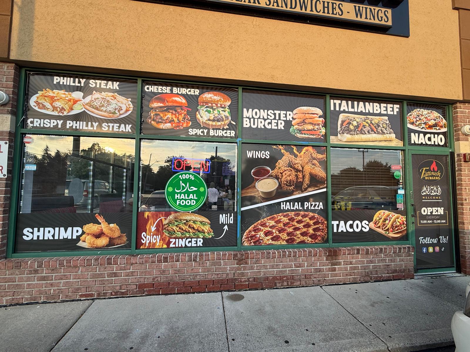 Fattoush Burgers storefront with large food promotional window graphics