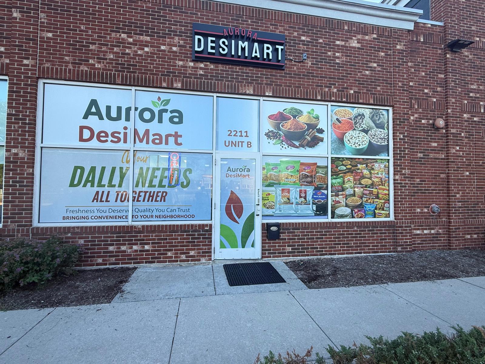 Aurora Desi Mart storefront with full-window grocery and product graphics