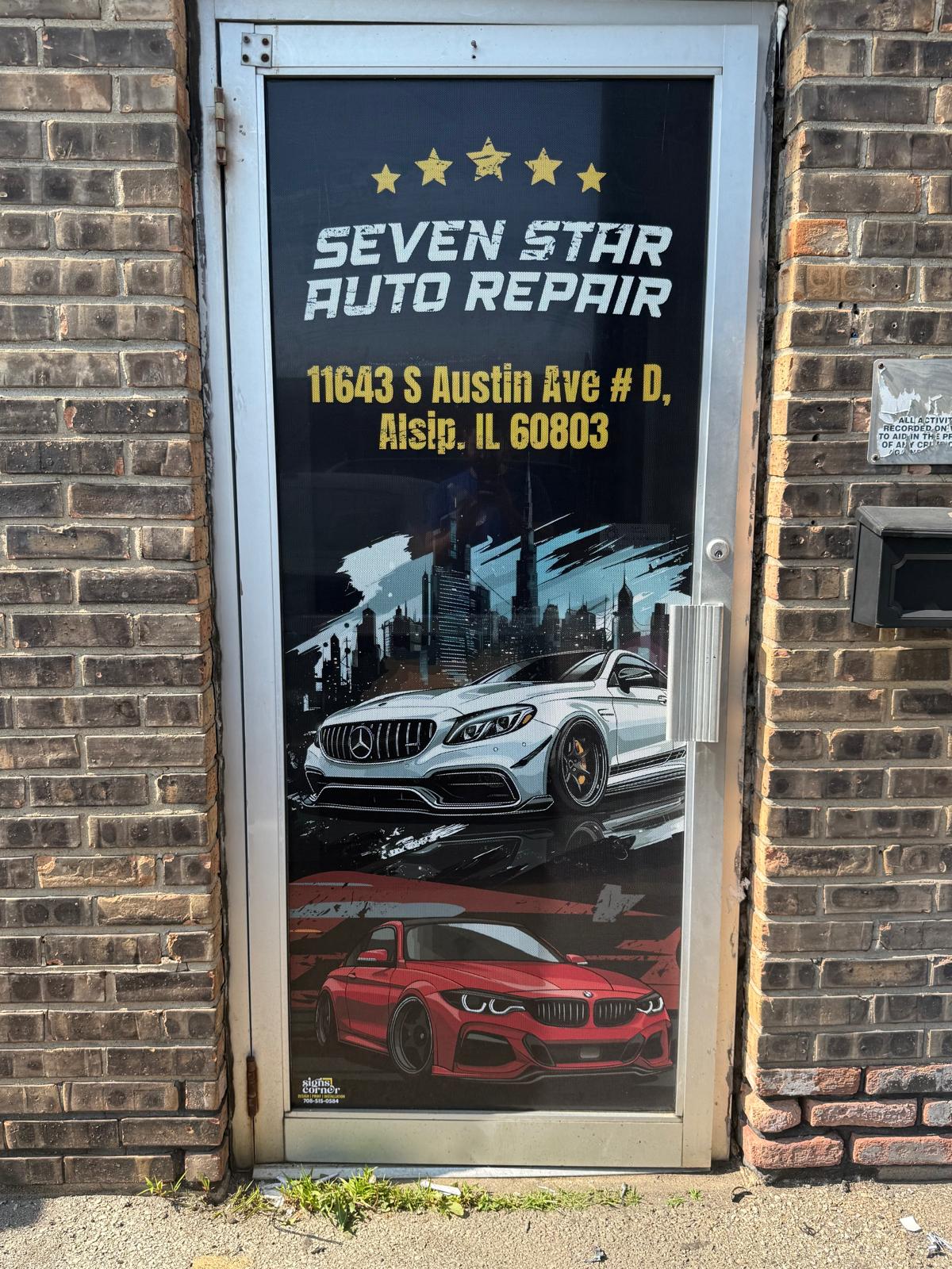 Seven Star Auto Repair entrance door with custom automotive printed graphics