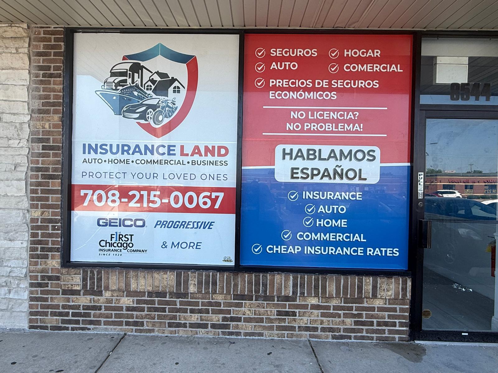 Insurance Land storefront with large bilingual insurance window graphics