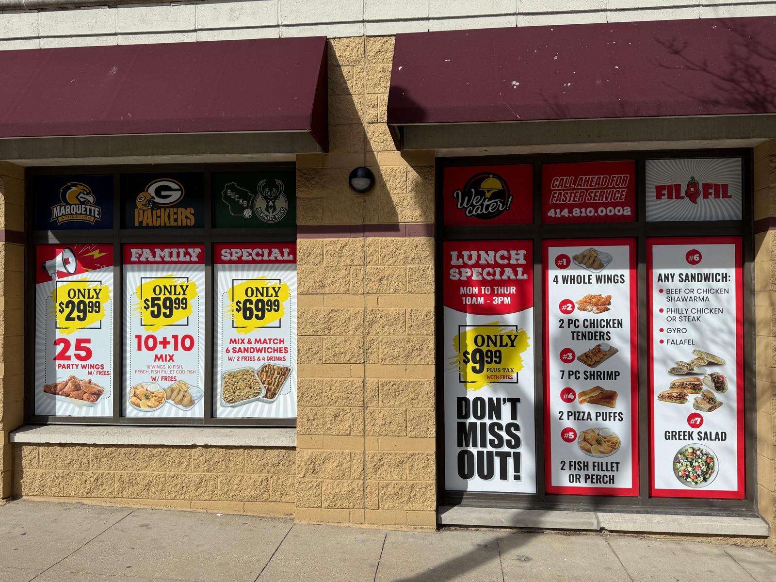 FilFil storefront with full-window promotional food and restaurant graphics
